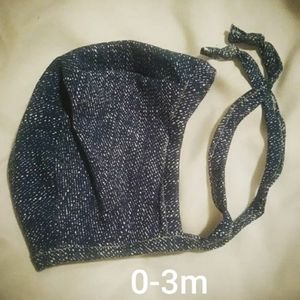 Blue and white speckled baby hat